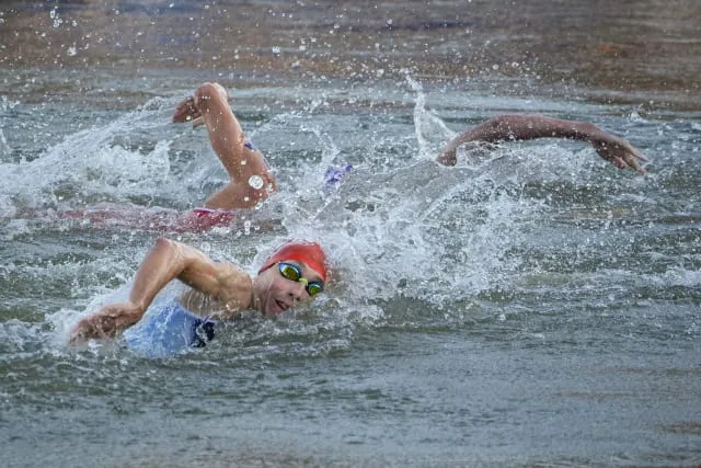 Olympic triathlon mixed relay gets underway with swims in the Seine amid  water quality concerns